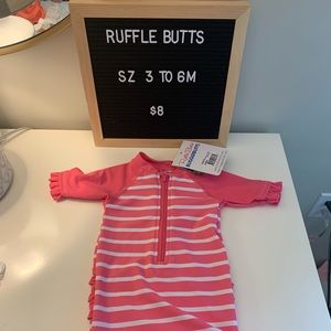 Ruffle Butts zip one piece